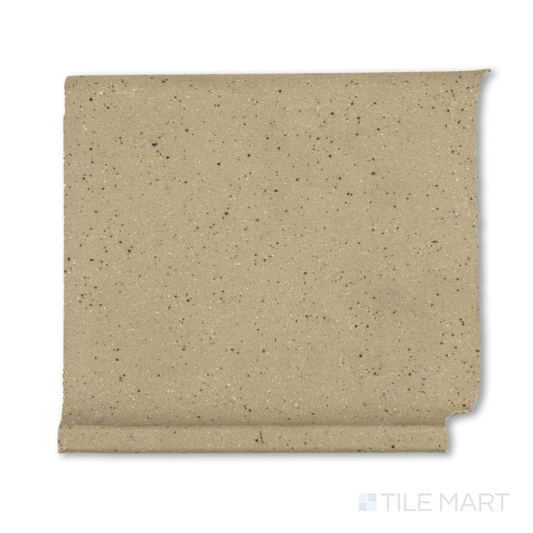 Flat-lay view of Metropolitan Buckskin 6x6 honed quarry cove base inside corner, presenting a brown-toned interior junction tile with a curved return.