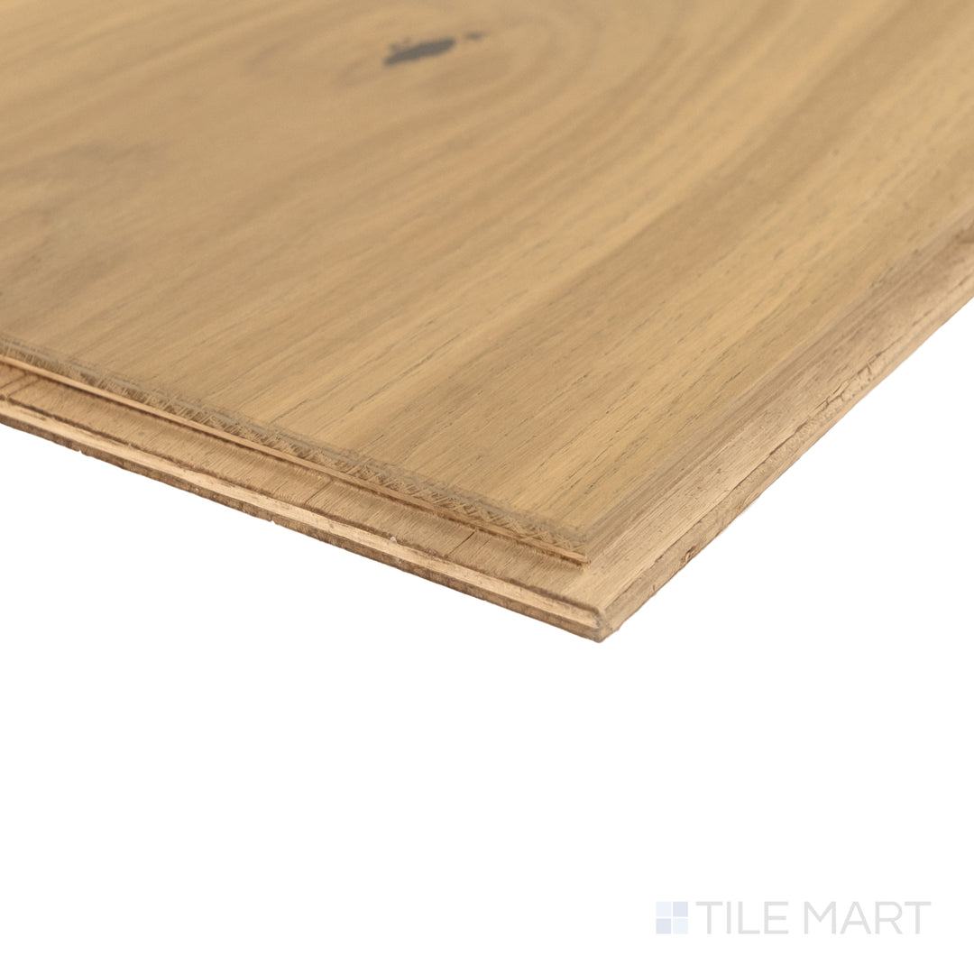 Corner close-up of Bordeaux Chambord 7.5x75 engineered hardwood showing rich grain and warm brown tone.