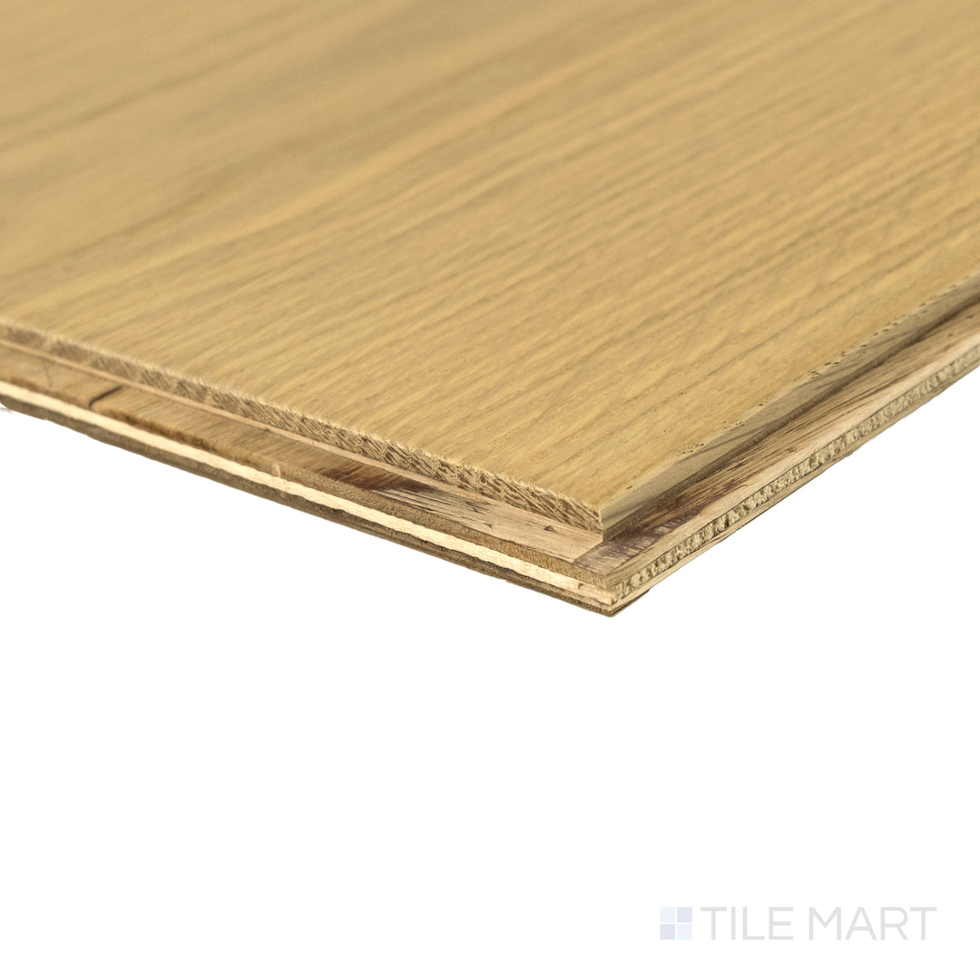 Corner detail of Maison Deux 9.5x87 engineered hardwood highlighting mid-tone warmth and smooth wood texture.