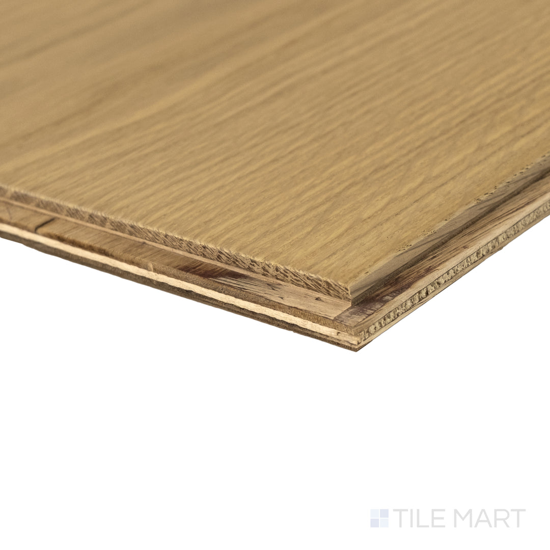 Corner view of Maison Trois 9.5x87 engineered hardwood featuring deep wood tone and softly brushed grain pattern.