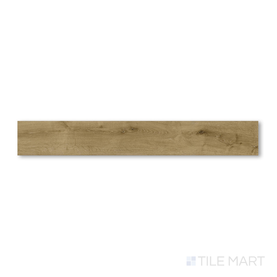Flat-lay photo of Shorewood Driftwood 9x60 luxury vinyl plank showcasing a cool weathered gray-brown finish with coastal-inspired grain texture.
