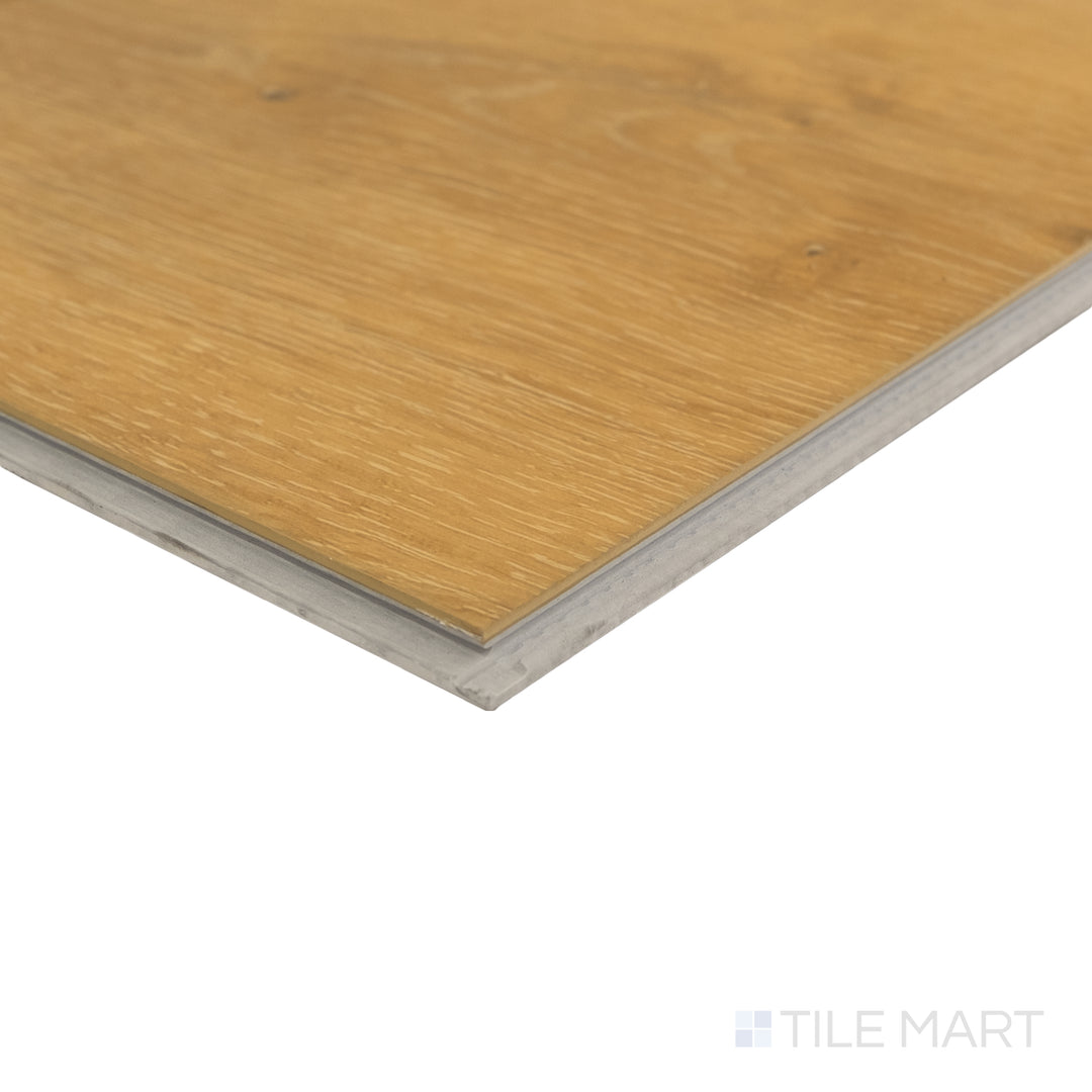 Corner detail of Shorewood Honey 9x60 luxury vinyl plank capturing golden tone and natural grain variation.