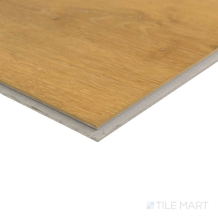 Corner detail of Shorewood Honey 9x60 luxury vinyl plank capturing golden tone and natural grain variation.