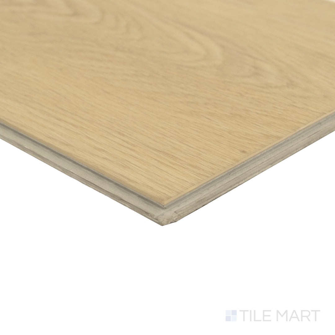 Corner close-up of Shorewood Linen 9x60 luxury vinyl plank showing light neutral hue and delicate wood-grain detail.