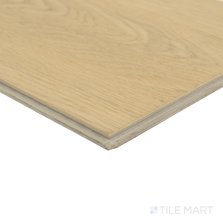 Corner close-up of Shorewood Linen 9x60 luxury vinyl plank showing light neutral hue and delicate wood-grain detail.