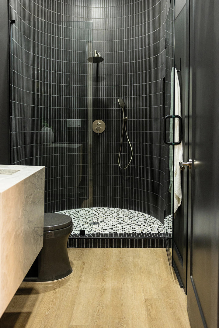 Shorewood Oak Luxury Vinyl Plank presented in a modern interior, showcasing organic wood detail and soft neutral tone.