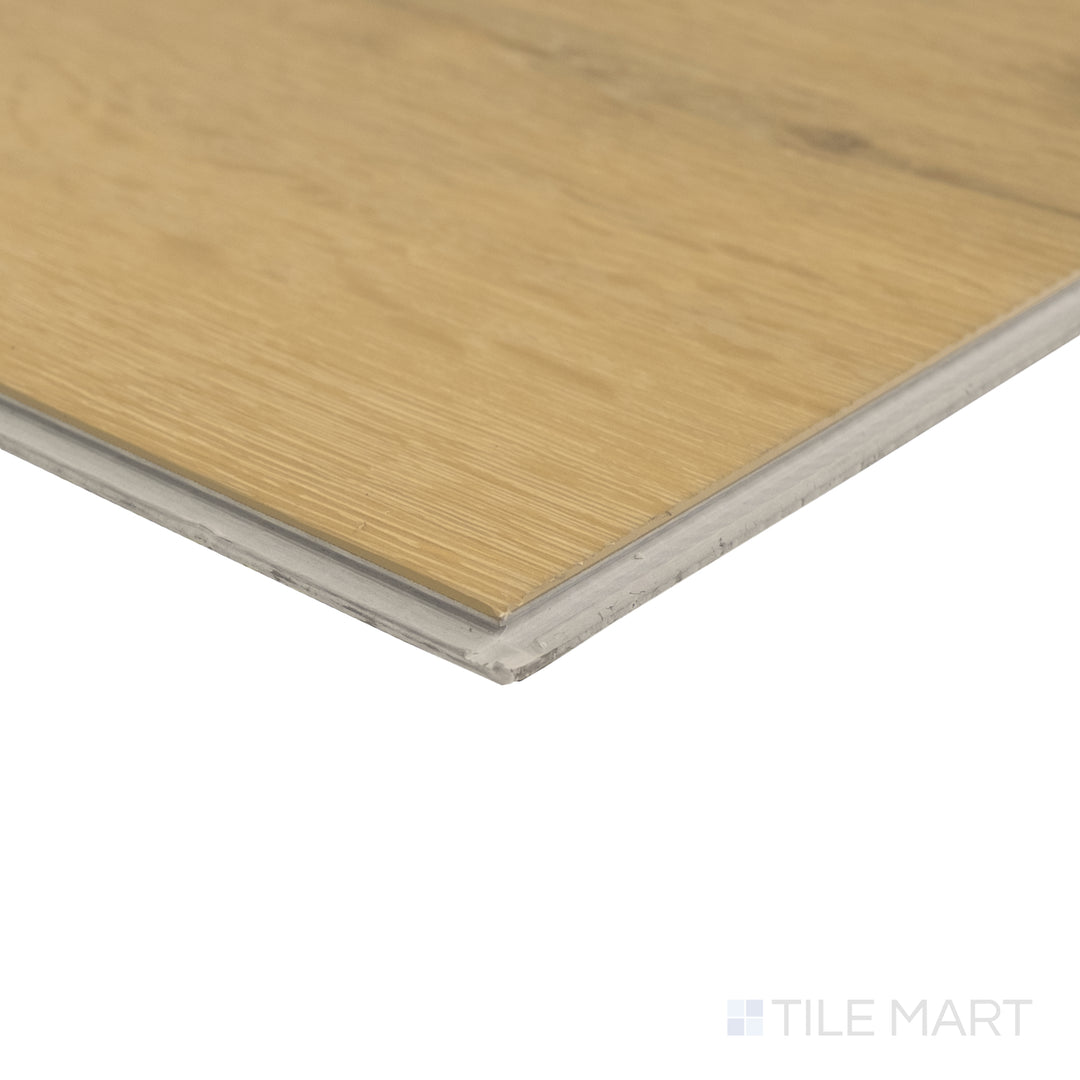 Corner detail of Shorewood Oak 9x60 luxury vinyl plank featuring classic oak tone and smooth realistic texture.