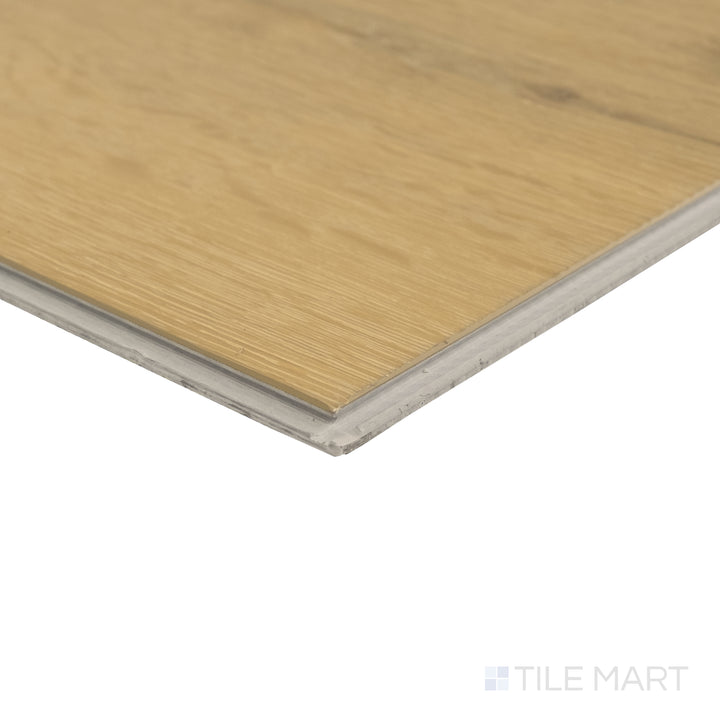 Corner detail of Shorewood Oak 9x60 luxury vinyl plank featuring classic oak tone and smooth realistic texture.