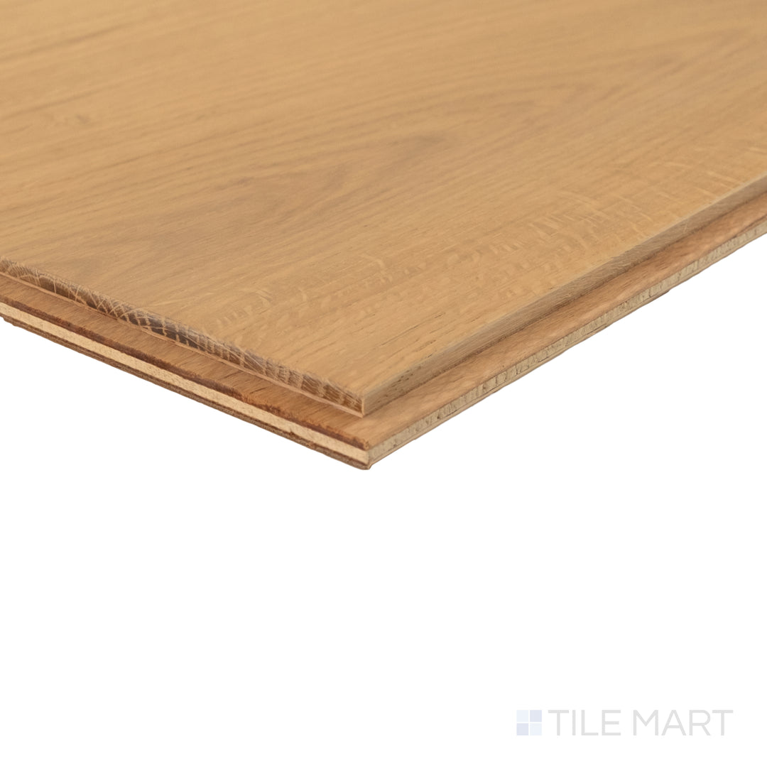 Corner close-up of Laguna Beach 9.5x87 engineered hardwood showing light coastal tone and smooth grain texture.