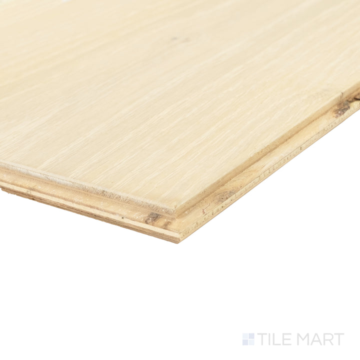 Corner close-up of Laguna Shell 9.5x87 engineered hardwood capturing pale tone and refined brushed wood texture.