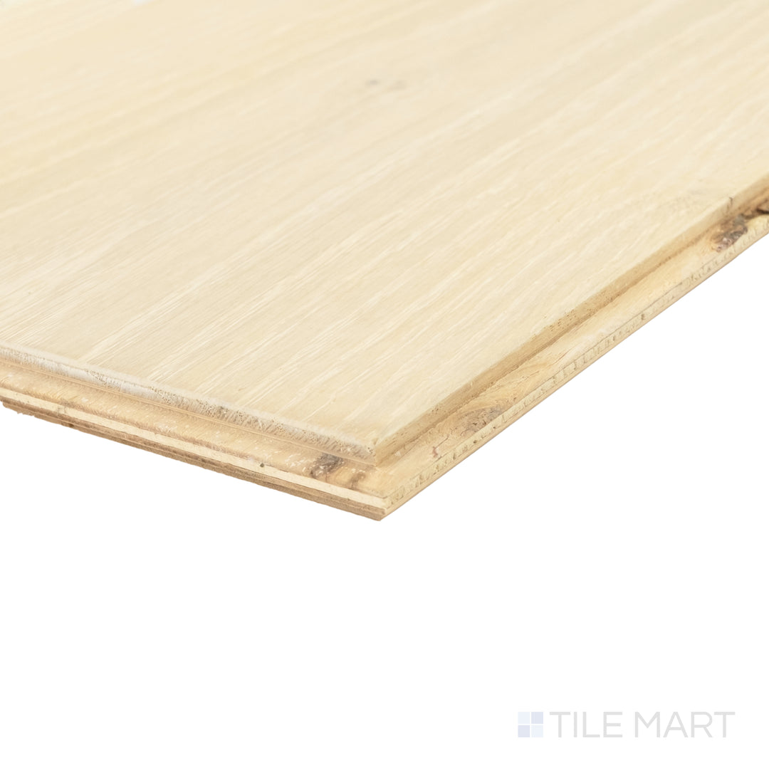 Corner close-up of Laguna Shell 9.5x87 engineered hardwood capturing pale tone and refined brushed wood texture.