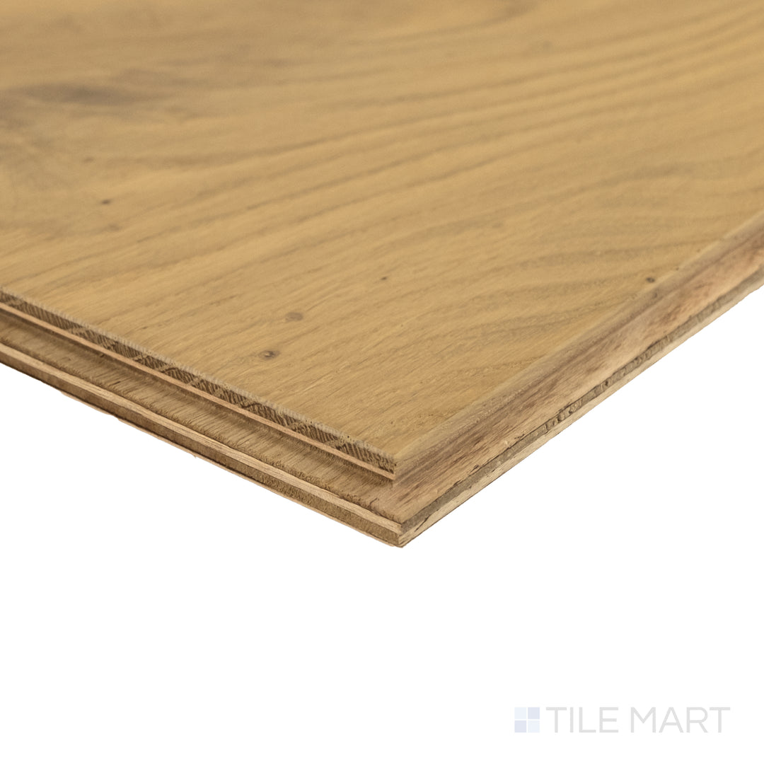 Corner close-up of Newport Beach 7.5x75 engineered hardwood showing light coastal tone and smooth wood grain texture.