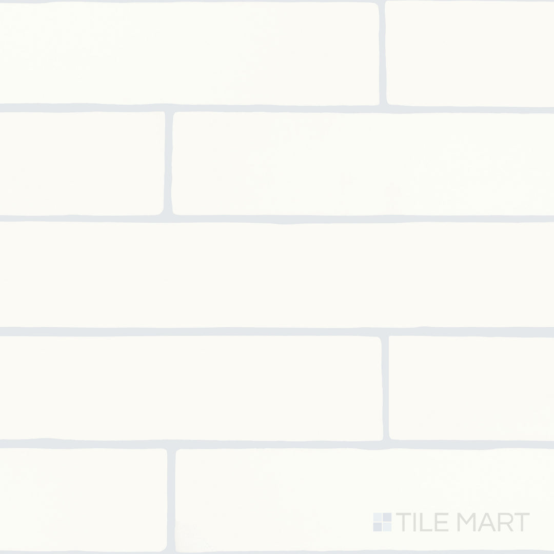 An overview of Farrier Cremello 2.5x15 satin glazed ceramic tiles, showcasing their smooth finish and warm, neutral tone.