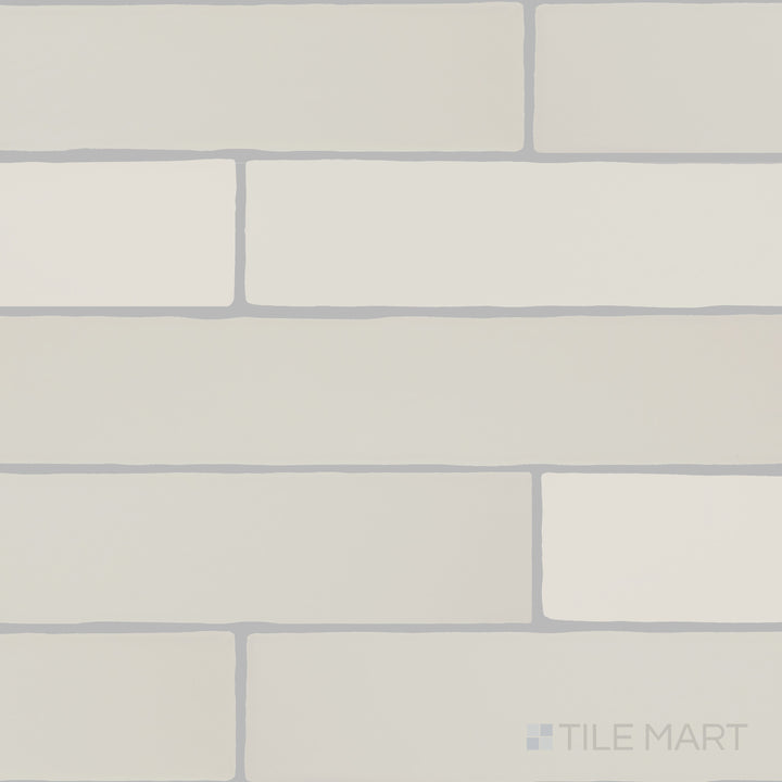 Overview of Farrier Andalusian Grey 2.5x15 satin glazed ceramic tiles, highlighting their soft grey hue and refined surface.