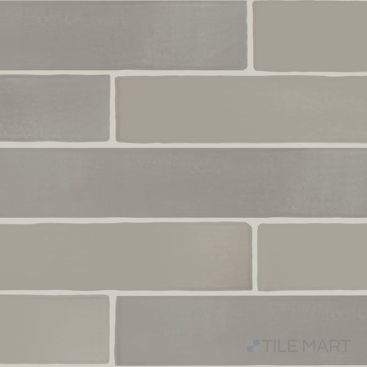 An overview of Farrier Dartmoor Grey 2.5x15 satin glazed ceramic tiles, featuring a deep grey shade and smooth satin texture.
