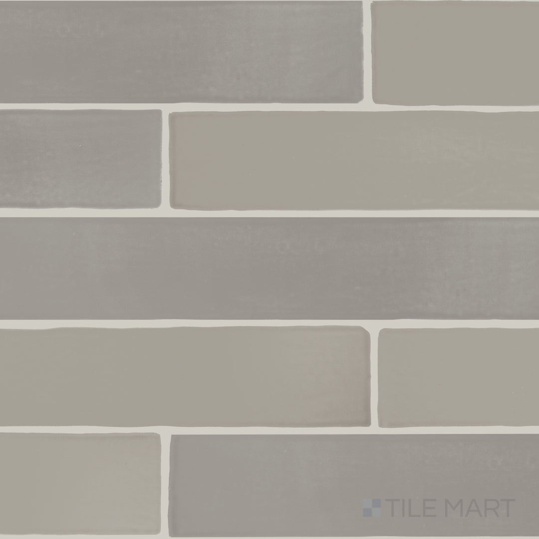 An overview of Farrier Dartmoor Grey 2.5x15 satin glazed ceramic tiles, featuring a deep grey shade and smooth satin texture.