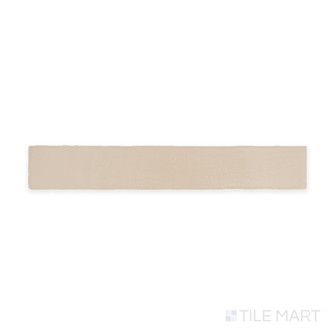 A top-down view of the Farrier Palomino 2.5x15 satin glazed ceramic tile highlights a warm, golden-beige hue with a smooth satin finish, ideal for creating inviting and elegant interiors.