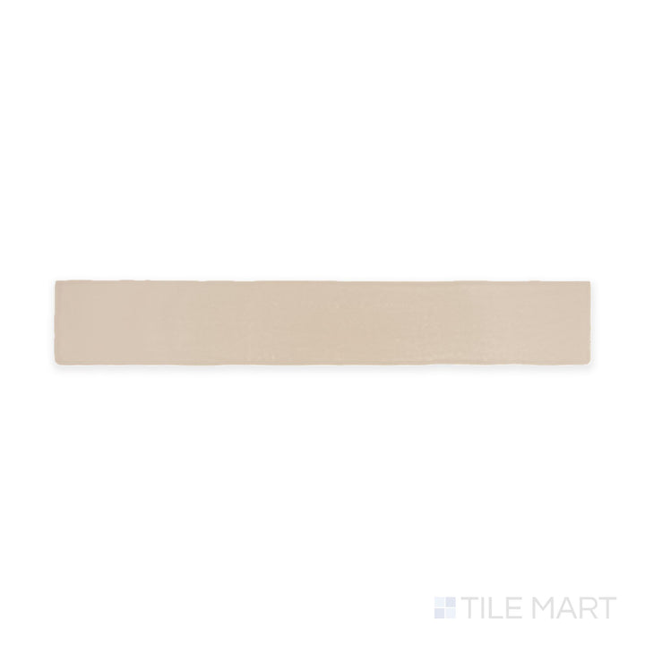 A top-down view of the Farrier Palomino 2.5x15 satin glazed ceramic tile highlights a warm, golden-beige hue with a smooth satin finish, ideal for creating inviting and elegant interiors.