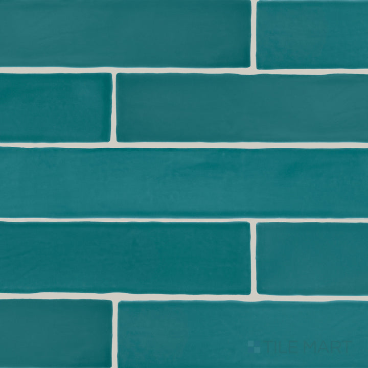 An overview of Farrier Blue Roan 2.5x15 satin glazed ceramic tiles, highlighting their rich blue hue and smooth satin surface.