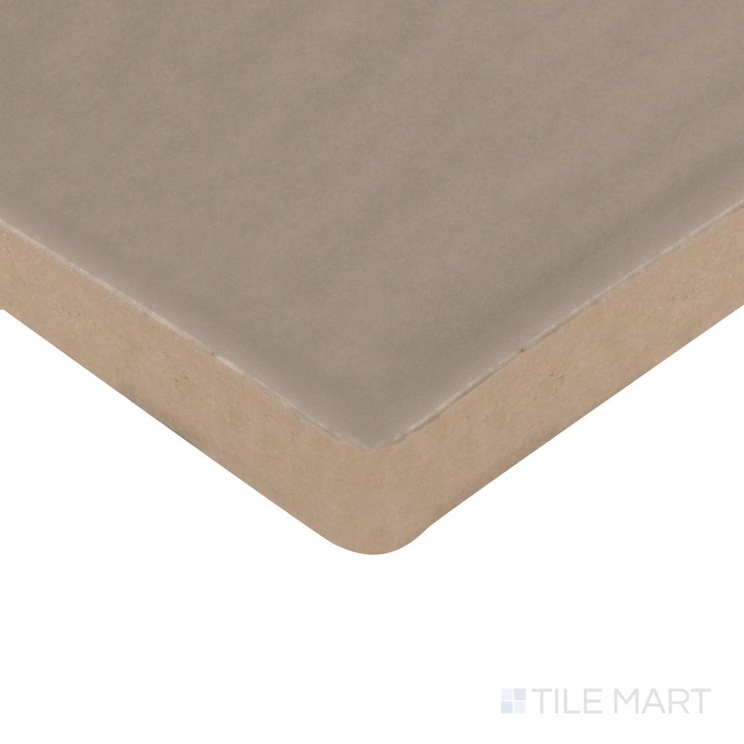 Corner angle of Farrier Grullo 2.5X15 Satin Glazed Ceramic Tile, emphasizing its earthy taupe tones with a smooth, satin surface.