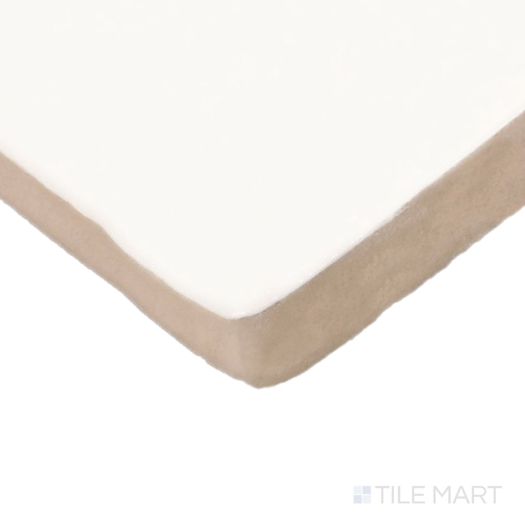 Side perspective of Farrier Cremello 2.5X5 Satin Glazed Ceramic Tile, capturing its creamy white shade with a glossy satin glaze.