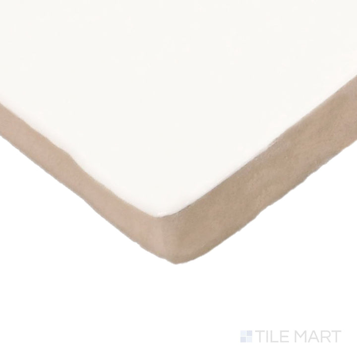 Side perspective of Farrier Cremello 2.5X5 Satin Glazed Ceramic Tile, capturing its creamy white shade with a glossy satin glaze.