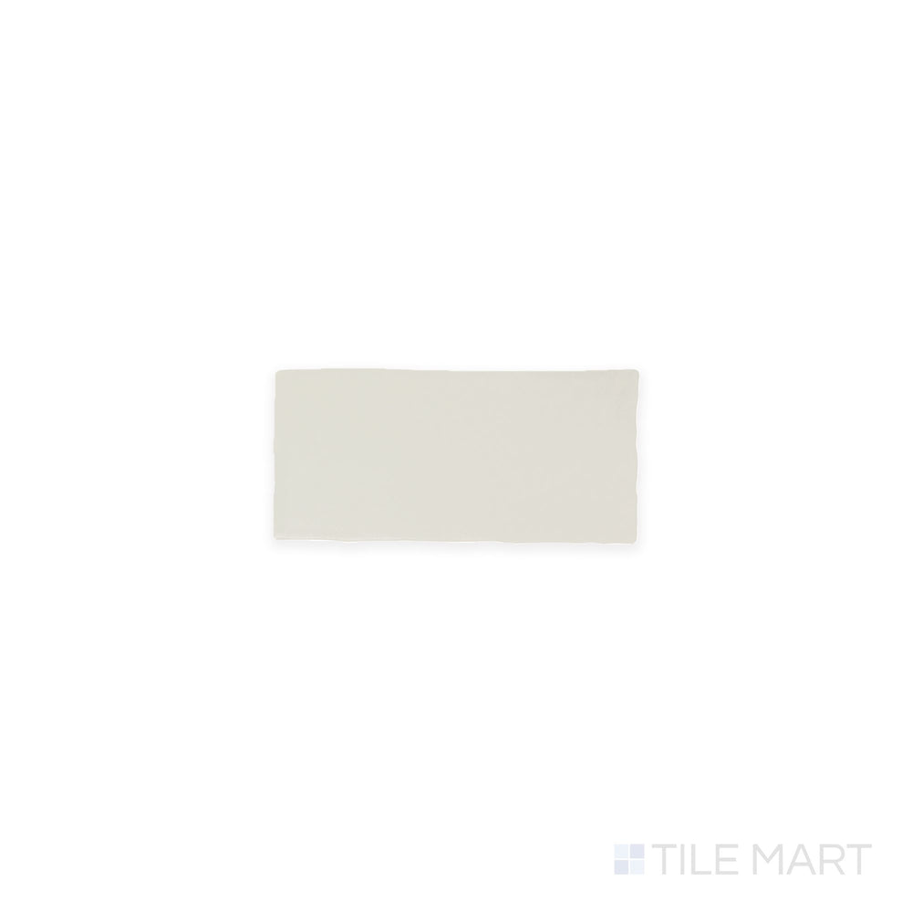 A top-down view of the Farrier Andalusian Grey 2.5x5 satin glazed ceramic tile reveals a refined gray shade with a smooth satin texture, blending seamlessly into contemporary interiors.