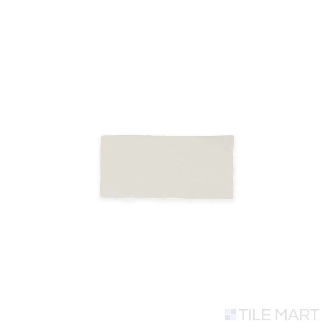 A top-down view of the Farrier Andalusian Grey 2.5x5 satin glazed ceramic tile reveals a refined gray shade with a smooth satin texture, blending seamlessly into contemporary interiors.