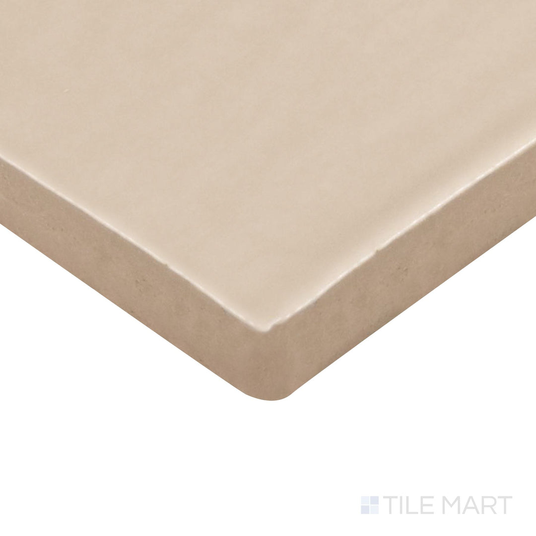 Angled view of Farrier Palomino 2.5X5 Satin Glazed Ceramic Tile, highlighting its warm golden-beige hues with a sleek satin finish.