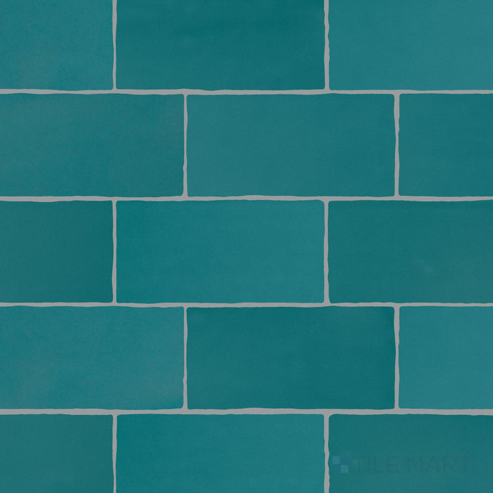 Viewed from the top, the Farrier Blue Roan 2.5x5 satin glazed ceramic tile features a soft blue-gray shade with a satin glaze, perfect for sleek and contemporary aesthetics.