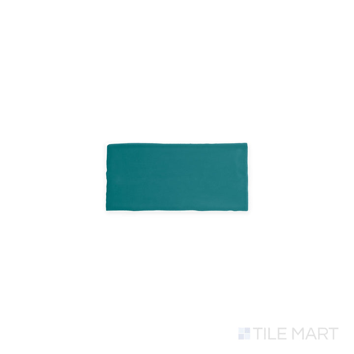 A top-down shot of Farrier Blue Roan 2.5x5 satin glazed ceramic tiles, highlighting their deep blue color and soft glaze.