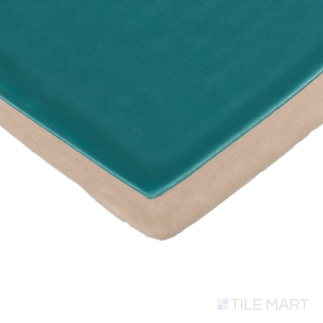 Close-up corner shot of Farrier Blue Roan 2.5X5 Satin Glazed Ceramic Tile, featuring a rich blue-grey shade with a smooth satin surface.