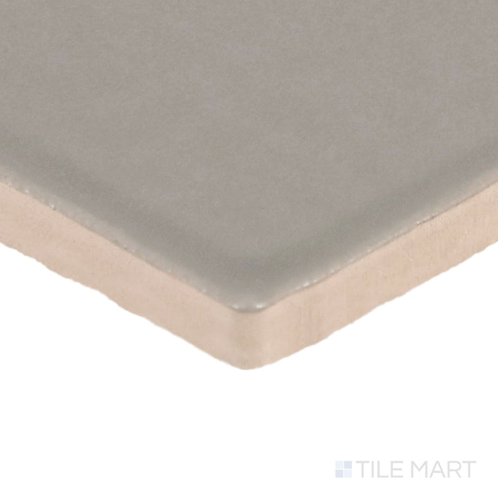 Corner-focused shot of Farrier Dartmoor Grey 5X5 Satin Glazed Ceramic Tile, highlighting its bold grey color with a refined satin finish.