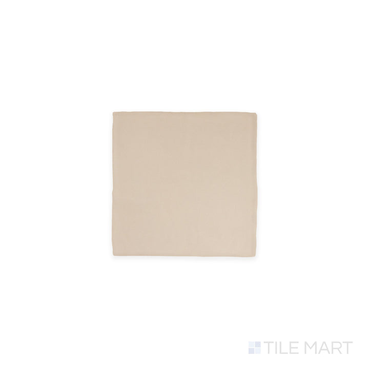 Diagonal view of Farrier Palomino 5x5 satin glazed ceramic tile, showcasing warm beige tones, a soft satin finish, and a structured square format.  