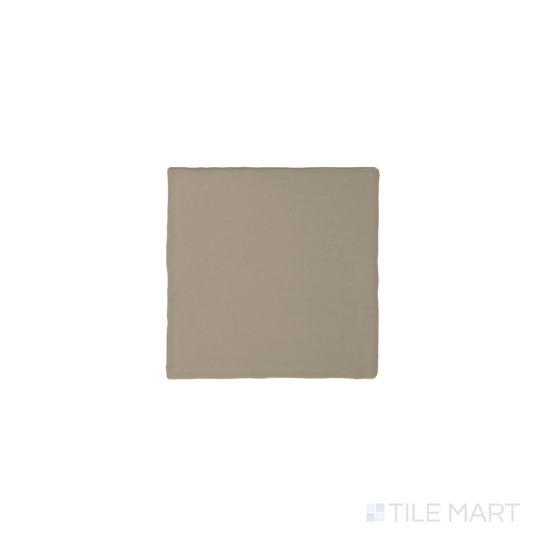 Seen from above, a single Farrier Grullo 5x5 satin glazed ceramic tile displays its surface color and smooth finish