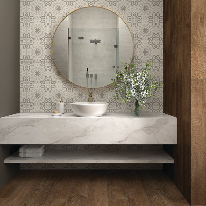 Featured in a room scene, the Memoir Crystal Grey 12x12 matte glazed ceramic tile creates a calm, modern feel with a smooth matte surface