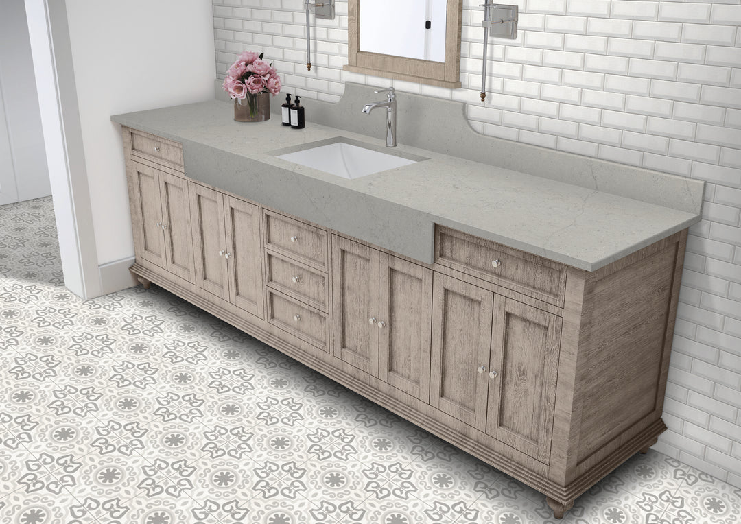 Memoir Crystal Grey 12x12 matte glazed ceramic tile displayed in a styled setting, highlighting its subtle grey pattern and smooth matte finish.