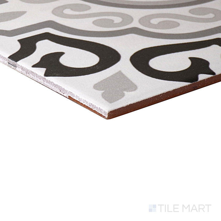 Angled view of Memoir Crystal Black 12X12 Matte Glazed Ceramic Tile, highlighting its deep black tones with a non-reflective, matte glaze.