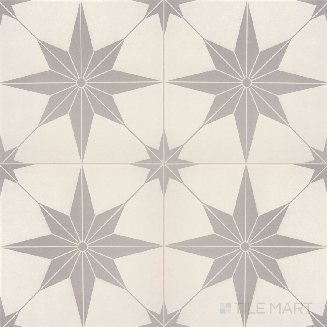 Aerial view of the Memoir Jewel Grey 12x12 matte glazed ceramic tile, highlighting its muted grey tones and refined matte texture.