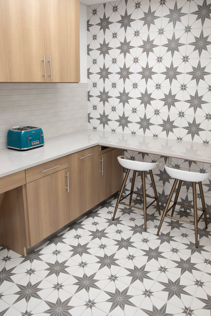 Memoir Jewel Grey 12x12 matte glazed ceramic tile featured in a contemporary scene with rich grey detailing and a soft, non-reflective surface.