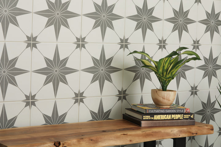 Used in a real-life space, the Memoir Jewel Black 12x12 matte glazed ceramic tile adds depth and contrast with a refined matte finish