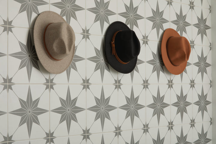 Memoir Jewel Black 12x12 matte glazed ceramic tile featured in a styled environment, emphasizing bold black tones and a smooth, refined matte finish.