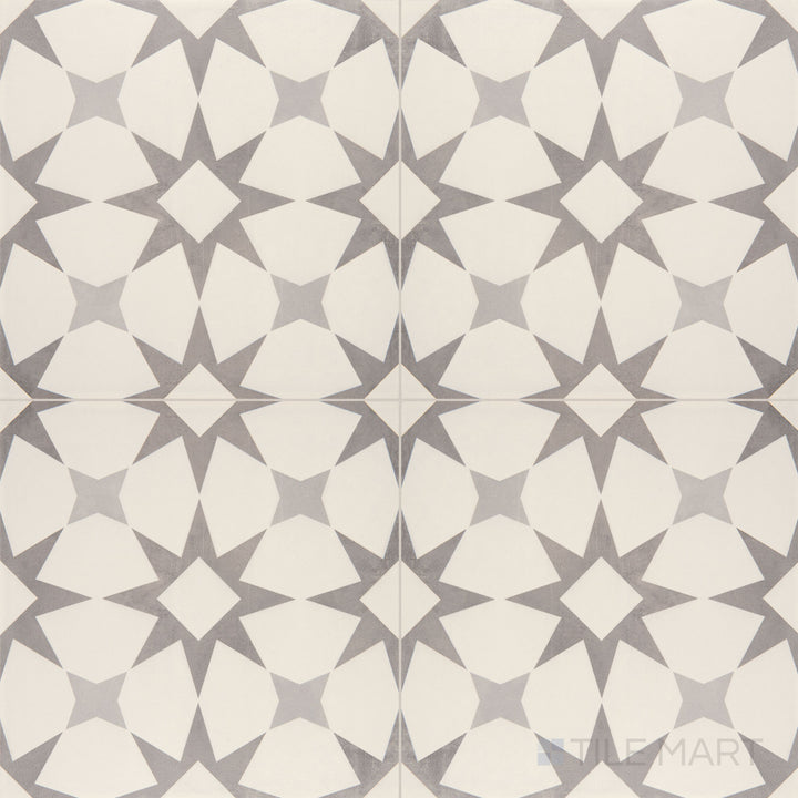 Direct overhead shot of the Memoir Cosmo Grey 12x12 matte glazed ceramic tile, emphasizing its modern grey color and sleek matte surface.