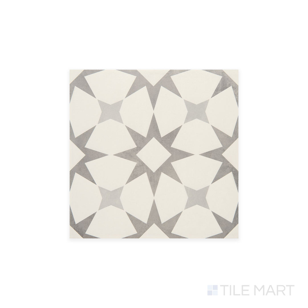 Diagonal view of Memoir Cosmo Grey 12x12 matte glazed ceramic tile, showcasing its cool gray tones, sophisticated matte finish, and structured square layout.  