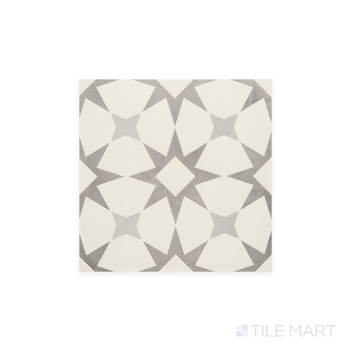 Diagonal view of Memoir Cosmo Grey 12x12 matte glazed ceramic tile, showcasing its cool gray tones, sophisticated matte finish, and structured square layout.  