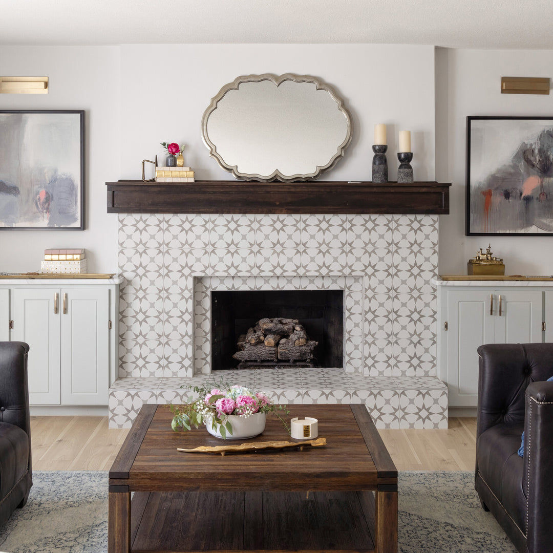 Displayed in a room setting, the Memoir Cosmo Grey 12x12 matte glazed ceramic tile brings a clean, understated feel to the space