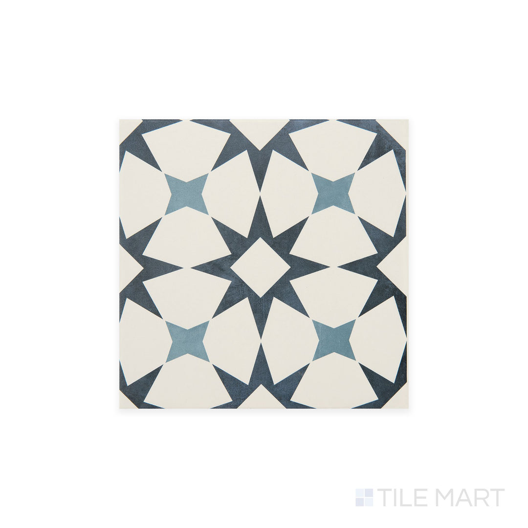Slanted perspective of Memoir Cosmo Blue 12x12 matte glazed ceramic tile, emphasizing its rich blue hues, a sleek matte surface, and contemporary square format.  