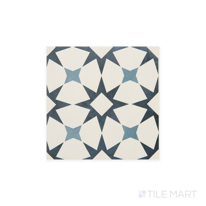 Slanted perspective of Memoir Cosmo Blue 12x12 matte glazed ceramic tile, emphasizing its rich blue hues, a sleek matte surface, and contemporary square format.  