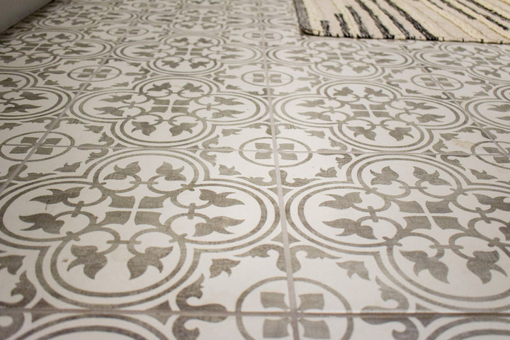 The Memoir Petal Grey 12x12 matte glazed ceramic tile stands out with its soft floral pattern and balanced grey tones, offering a calm and contemporary aesthetic.