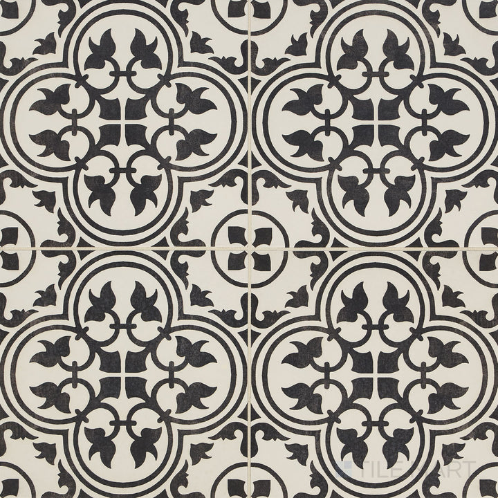 Flat-lay shot of the Memoir Petal Black 12x12 matte glazed ceramic tile, highlighting its deep black shade and soft matte finish.